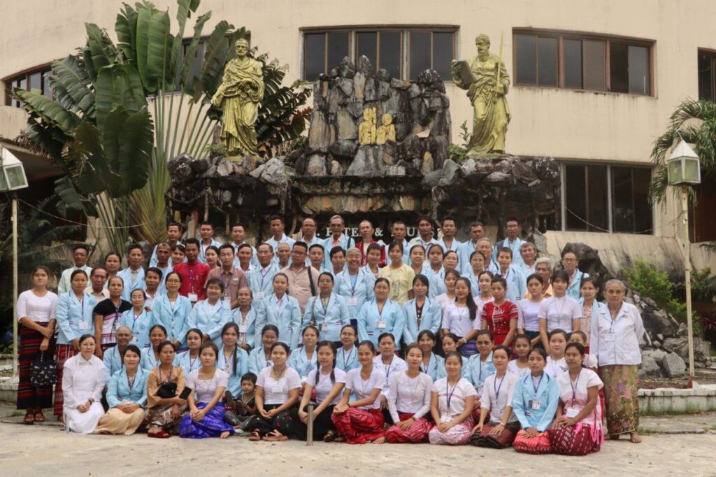 Group photo of Yangon Catechists' Annual retreat and refresher training in front of the church (Photo by RVA Sgaw Karen)